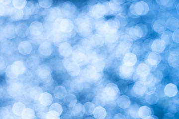 Abstract background of blue glittering lights