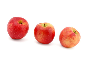 Three red apples