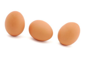 Three brown eggs