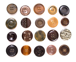 collection of various sewing button on white background
