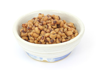 Large serving of black eyed peas in an old bowl