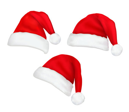 Three red santa hats. Vector.