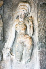 Statue in ancient rock temples at Ajanta ,  India