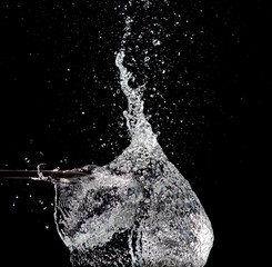 Splash of water on black