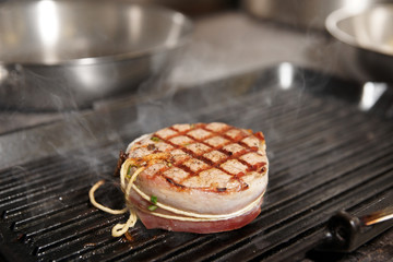 Tenderloin steak on grill