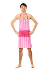 Naked man wering pink apron