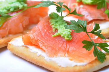smoked salmon with wasabi  on cracker isolated