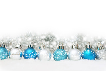 blue and silver snowflake balls in a row