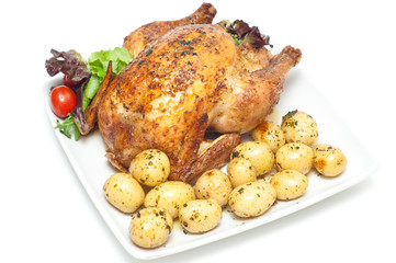 baked chicken with vegetables isolated