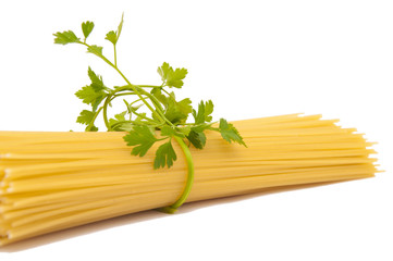 spaghetti tied with green herbs