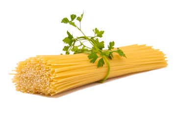 spaghetti tied with green herbs