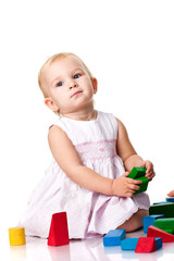 Beautiful baby  building a castle