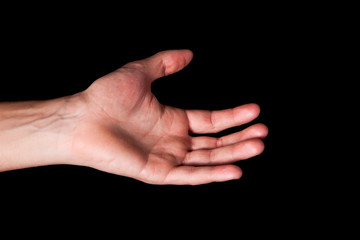 Fototapeta premium Male hand on black background