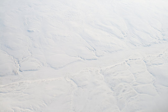 Aerial View Snowy Frozen River Cliffs Baffin Island, Canada