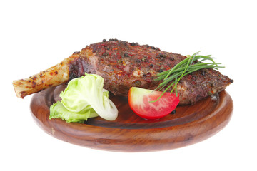 meat savory on wooden plate: roast shoulder