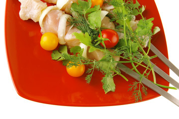 fresh chicken kebabs on plate