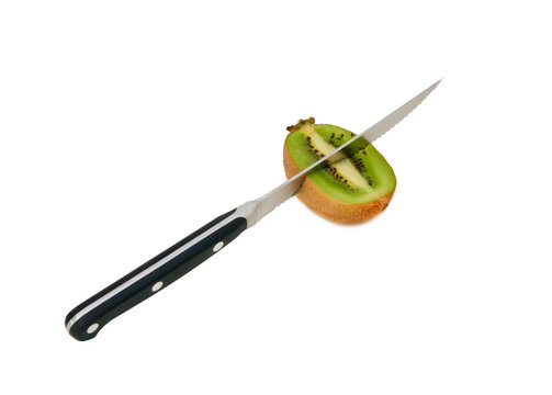 Kiwi with kitchen knife isolated on white