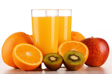 Composition with two glasses of orange juice and fruits
