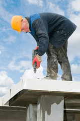 builder roofer with drill