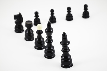 Set of black chess figures on a white background