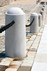 Fototapeta na wymiar stone post fence in perspective