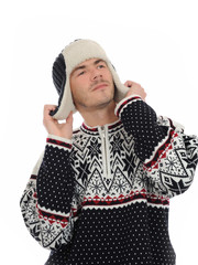 Funny winter man in warm hat and clothes listening. isolated on