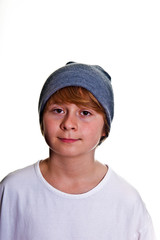 boy with cap looking friendly and cute