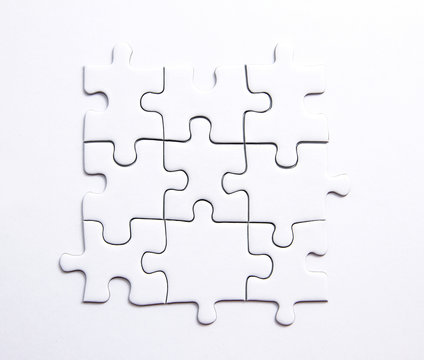 Quadratisches St&uuml;ck aus 9 Puzzleteilen mit Textfreiraum