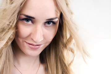 Fototapeta premium Portrait of a young girl smiling