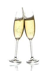 two glasses of sparkling wine clinking