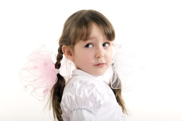 Photo of a little girl turning back