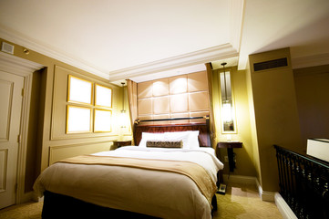 Double bed in the modern interior room