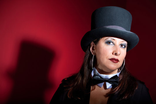 Beautiful women in top hat and bow-tie