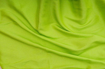 Bright satin fabric folded to be used as background