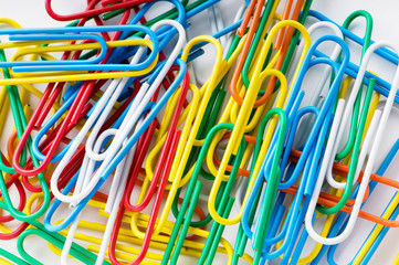 Close up of many colourful paper clips