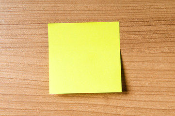 Many reminder notes on the wooden background