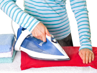 Young lady ironing her clothes
