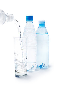 Drinking water in the glass and bottles