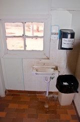 dirty and old toilette in the australian outback