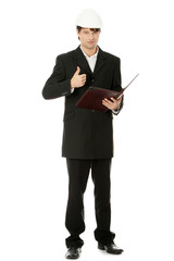 Young engineer in helmet