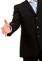 A businessman with an open hand ready to seal a deal. isolated