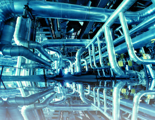 Industrial zone, Steel pipelines in blue tones with reflection