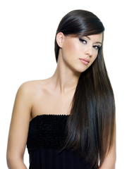 Beautiful young woman with long straight brown hair