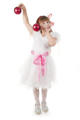 Girl plays with Christmas red ball