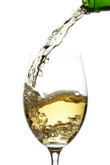 White wine pouring into glass