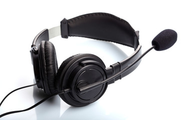 Headphones with a microphone over white background