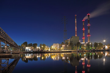 Fototapeta premium Industrial landscape. Heat station and the river.