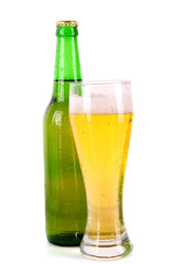 Bottle of beer and cup isolated on white