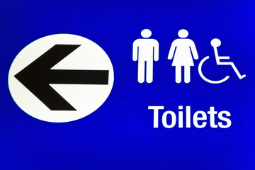 Blue airport direction wc sign