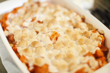 Mashed sweet potatoes with marshmallow topping